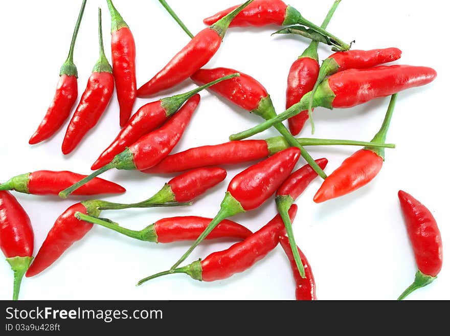 Red hot peppers on white background