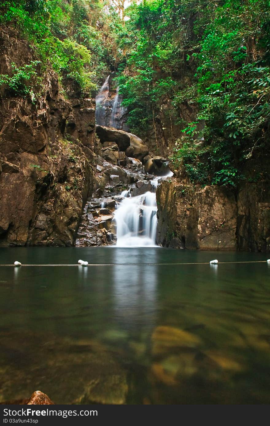 Water fall in the rain forest of Thailand