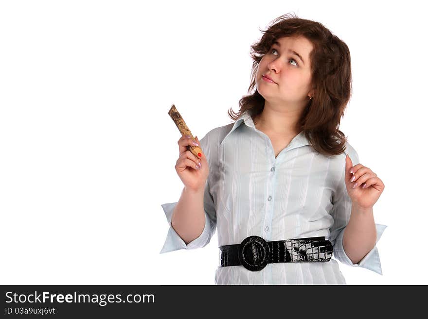 Chubby girl holds pencil and looks up.