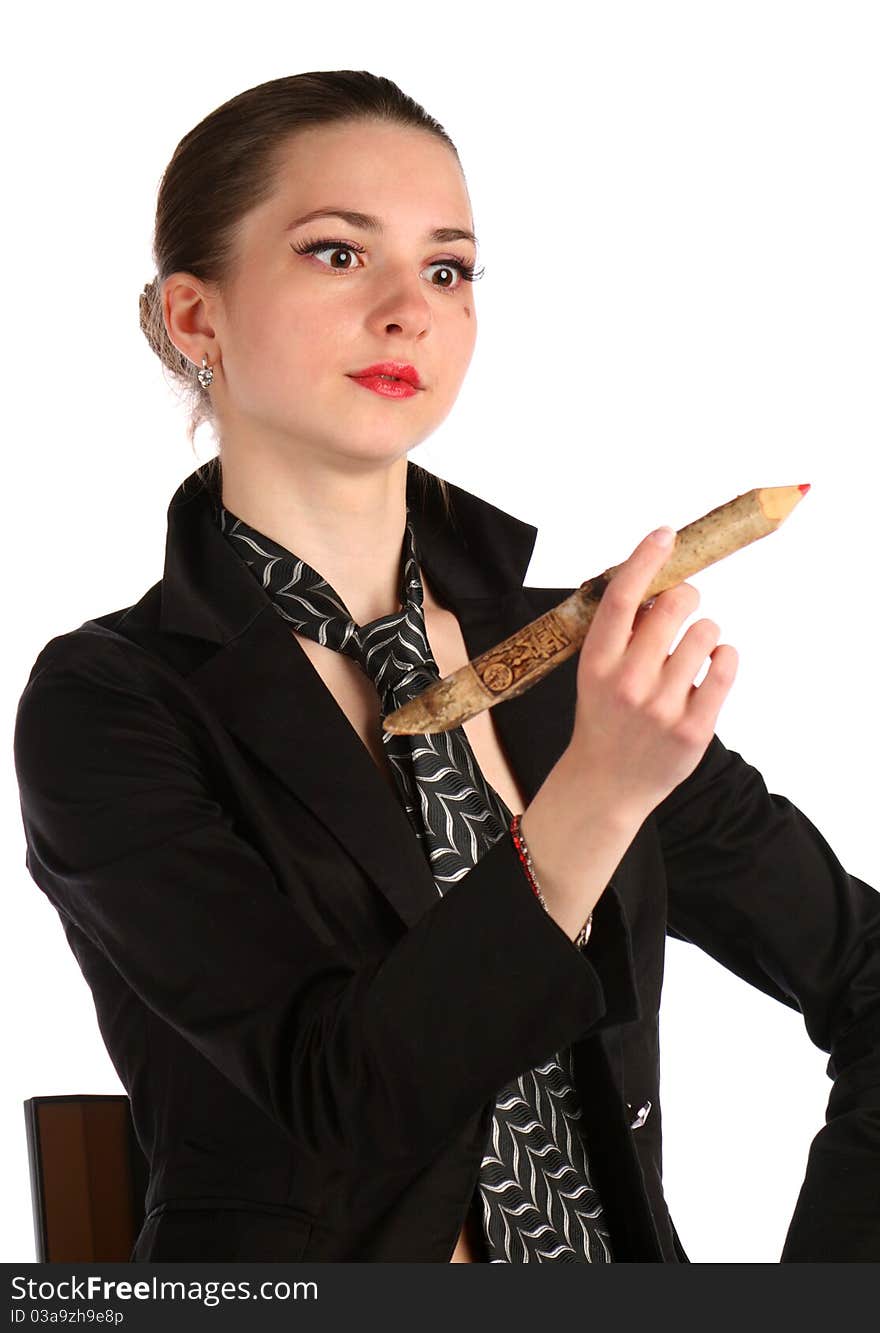 Girl In Black Suit Looks At Pencil.