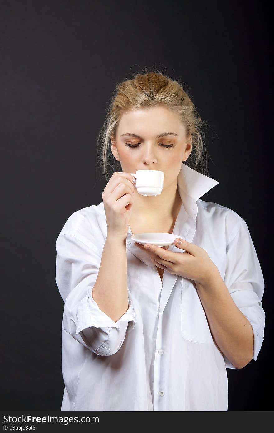 Beautiful Woman Drinking Coffee, sensual blond in man's shirt. Beautiful Woman Drinking Coffee, sensual blond in man's shirt