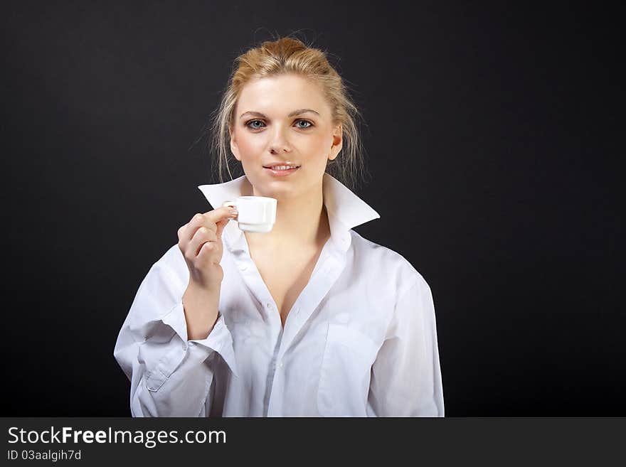 Beautiful Woman Drinking Coffee, sensual blond in man's shirt. Beautiful Woman Drinking Coffee, sensual blond in man's shirt