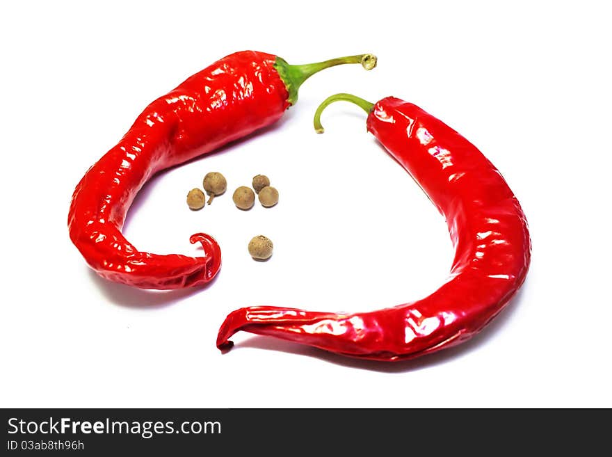 Red hot chili peppers on white background