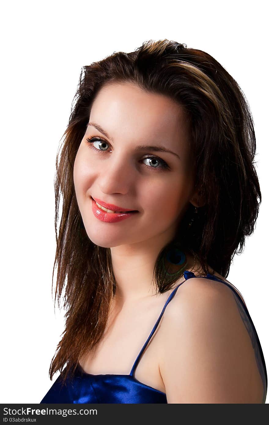 Portrait of young beauty smillimg woman in blue dress posing on black background in studio. Portrait of young beauty smillimg woman in blue dress posing on black background in studio