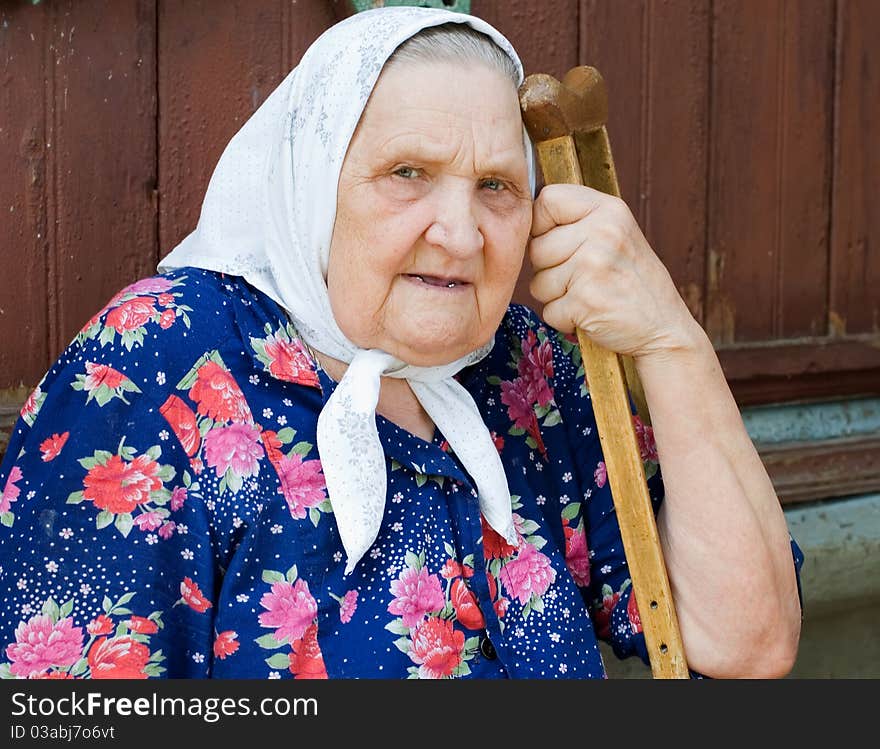 Portrait of the old woman in park