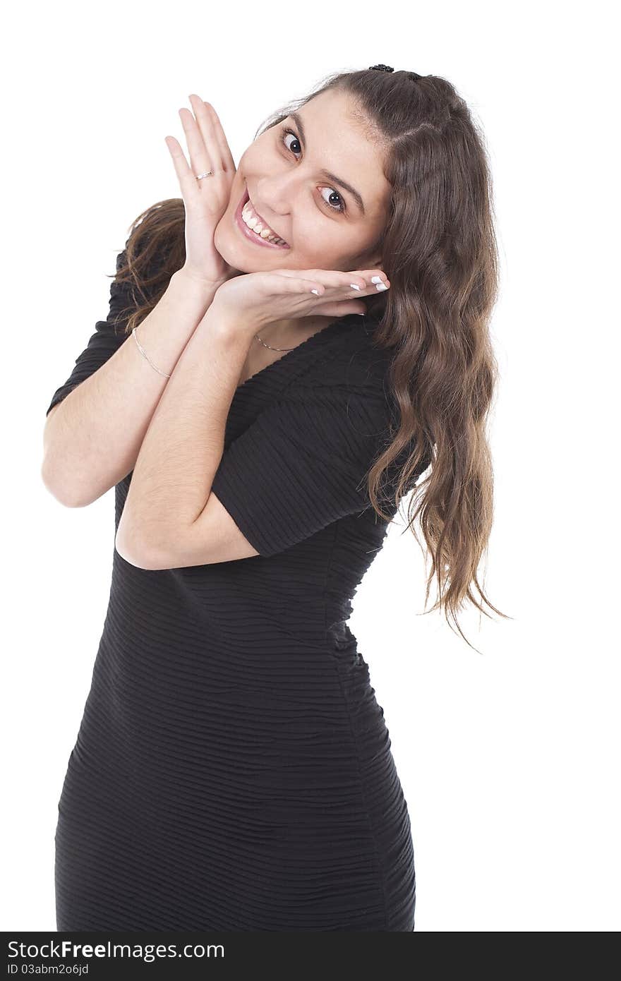 Portrait of a smiling young woman with hands over her face. Portrait of a smiling young woman with hands over her face