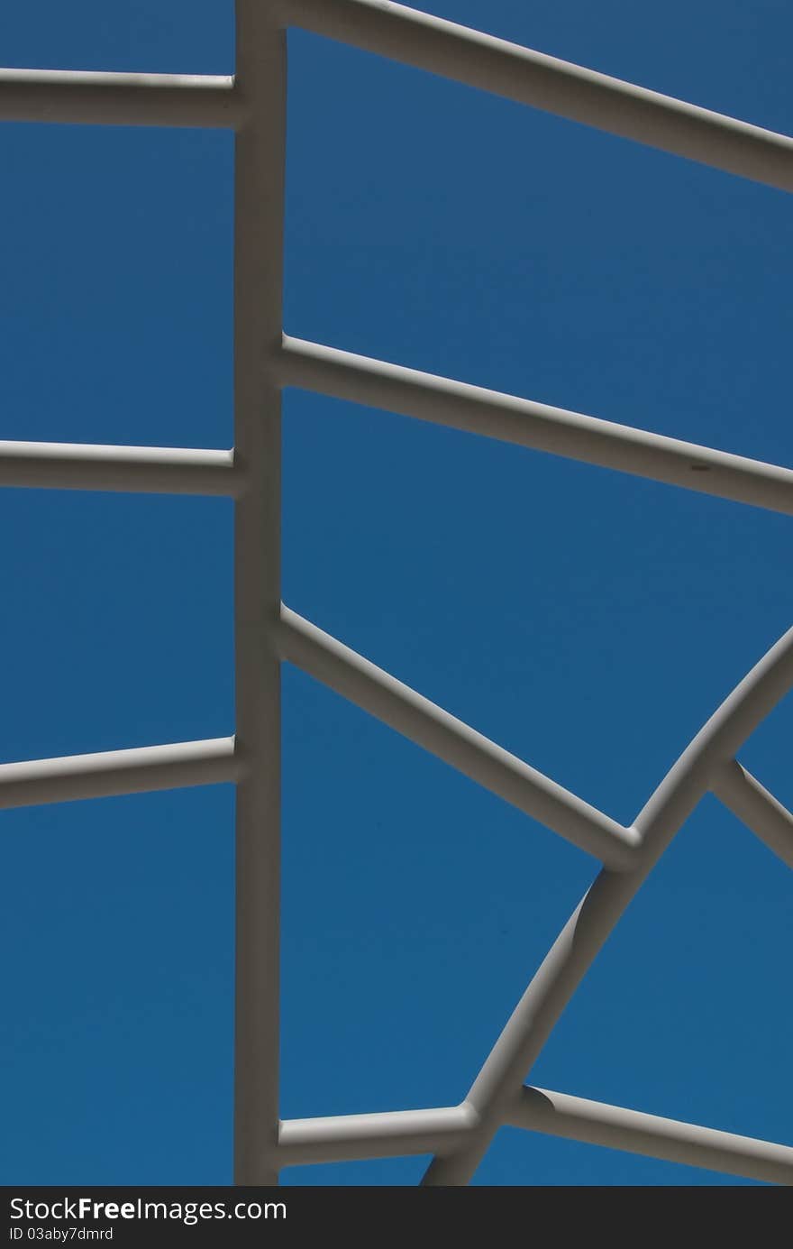 Abstract ladder against blue sky