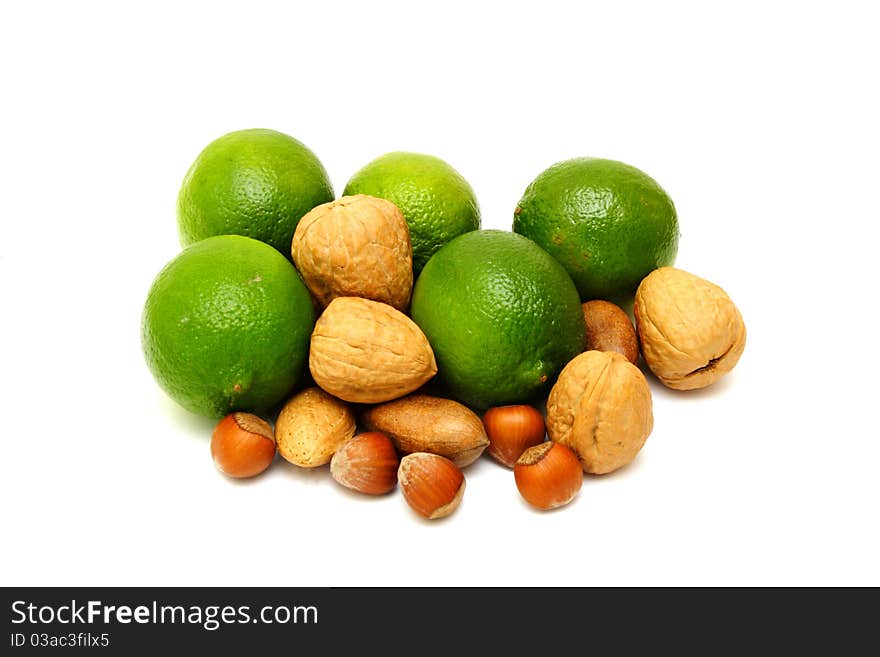 Green laime with nuts isolated on white