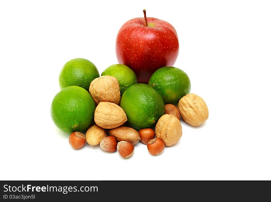 Green laime with nuts, apple isolated on white