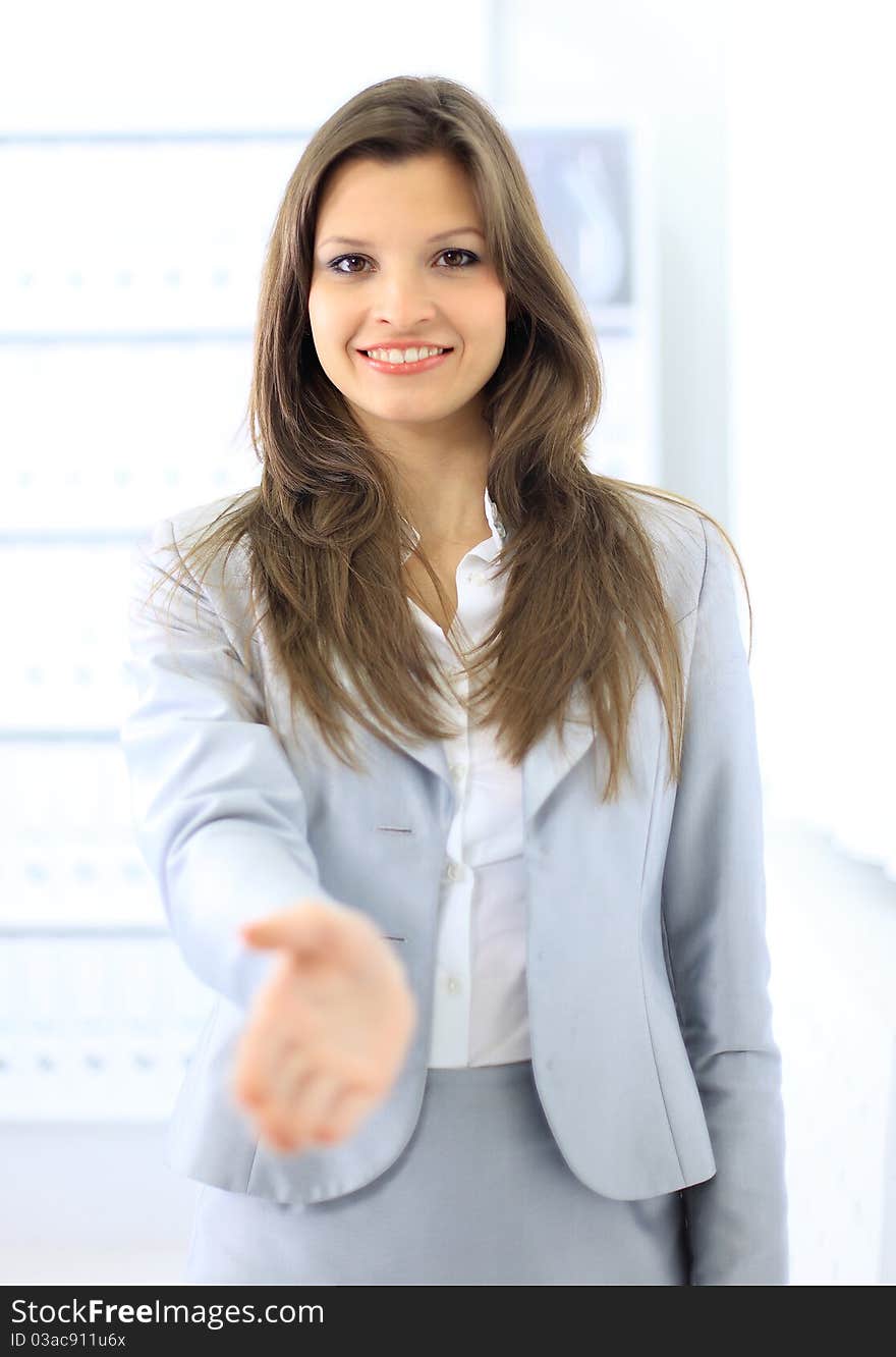 Woman with an open hand ready for handshake