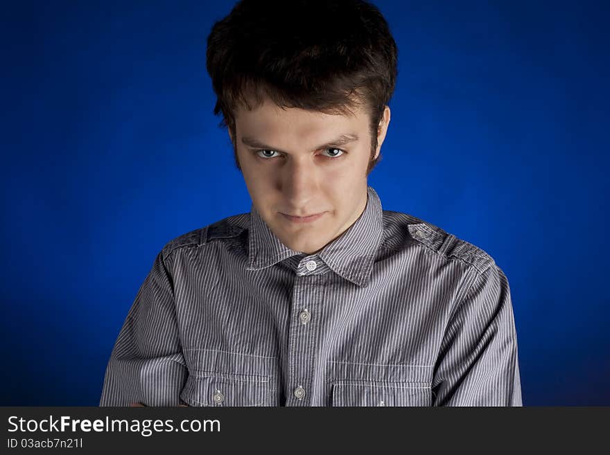 Portrait of a young man in a studio. Portrait of a young man in a studio