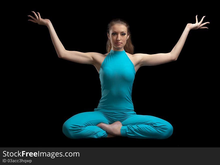 The beautiful girl is engaged in yoga