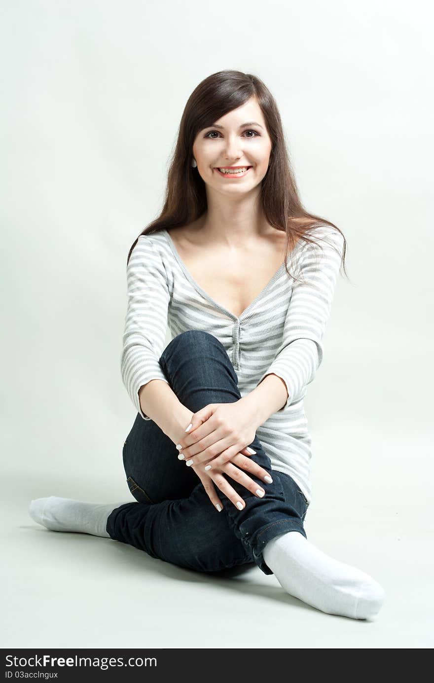 Girl sitting on a floor