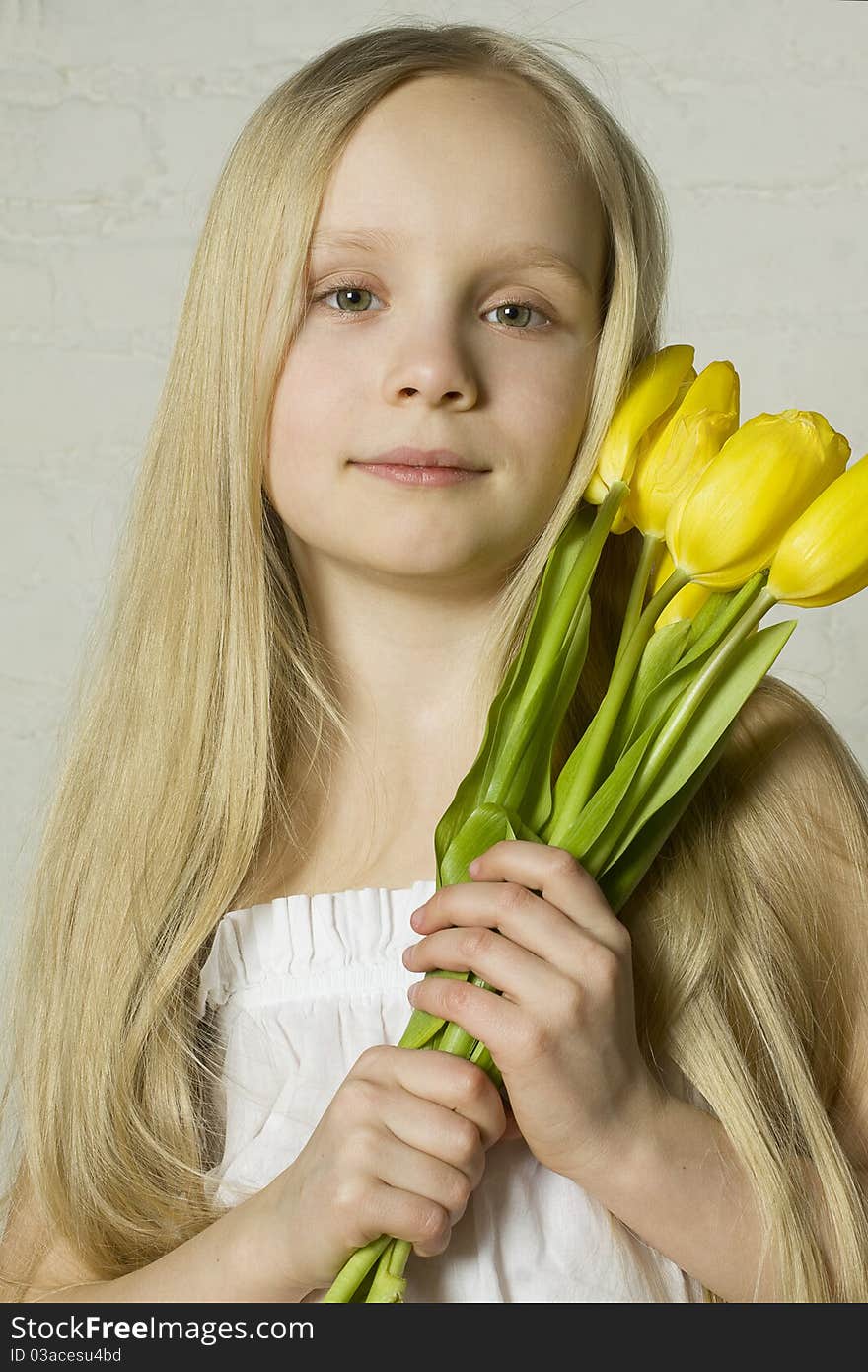 Young Girl With Spring Flowers