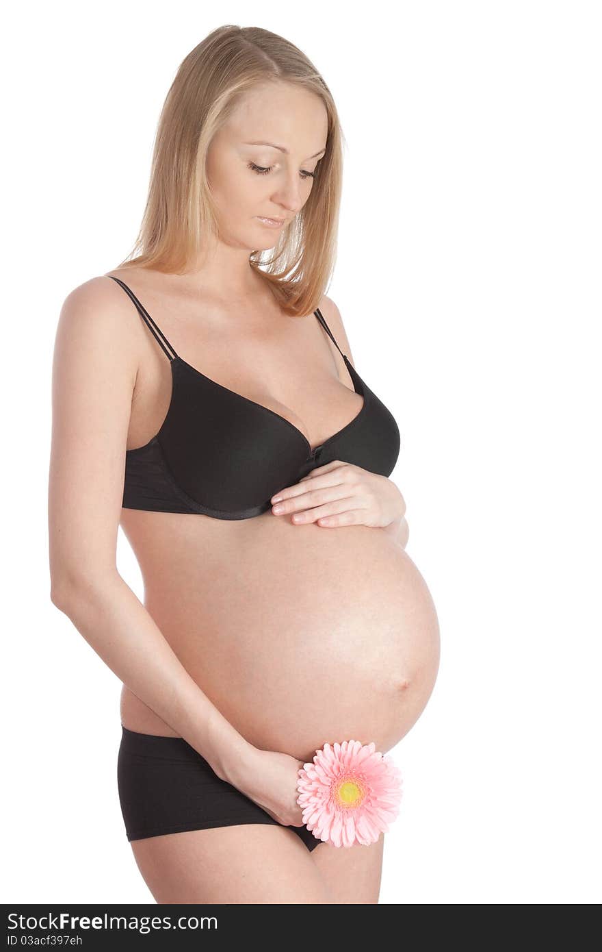 Pregnant woman on an isolated white background. Pregnant woman on an isolated white background