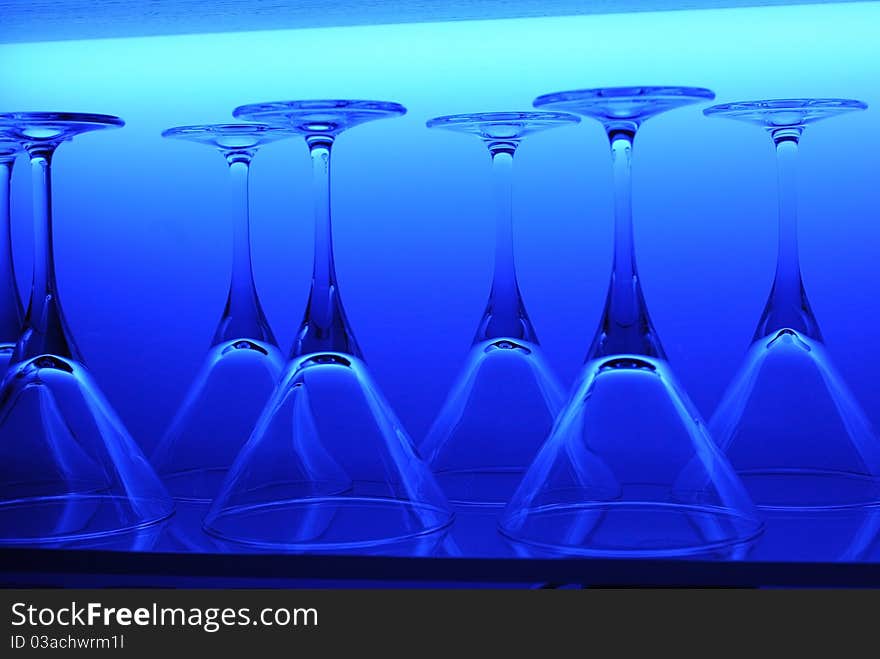 Glasses in the line lighted with background light