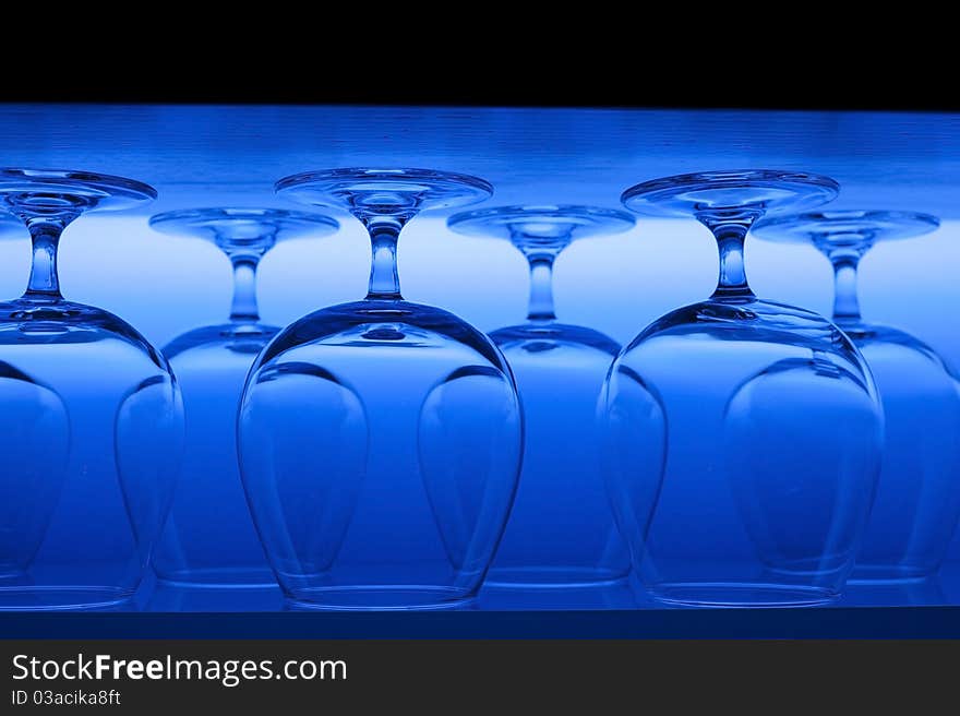 Glasses in the line lighted with background light