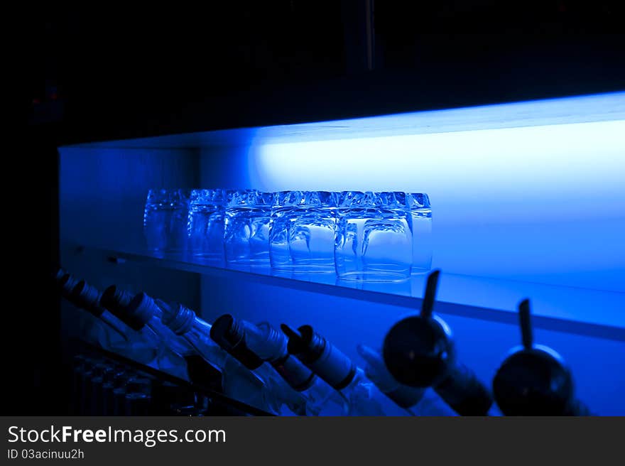 Glasses in the line lighted with background light