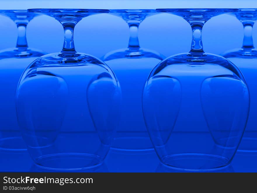 Glasses in the line lighted with background light