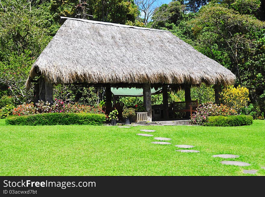 Rural tropical hut in the backyard of a house. Rural tropical hut in the backyard of a house