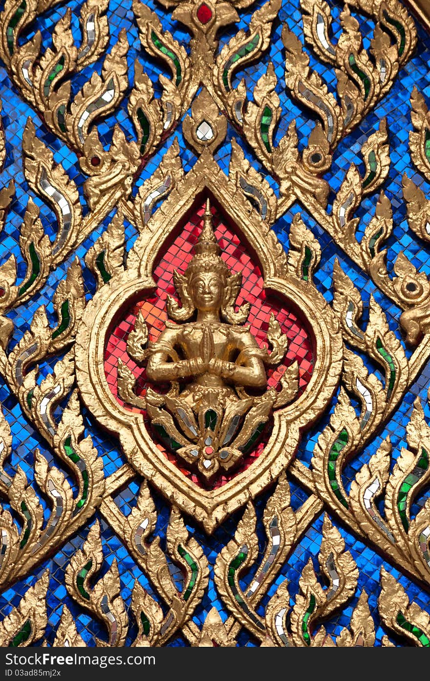 Classic Thai art on a temple's gable in Bangkok Thailand. Classic Thai art on a temple's gable in Bangkok Thailand.