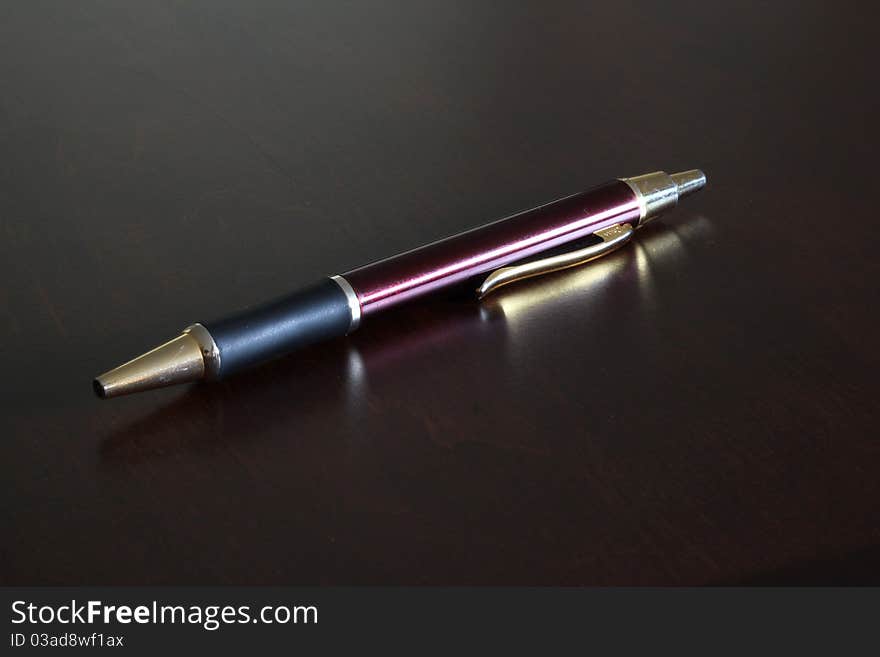 Nice pen on a wooden surface