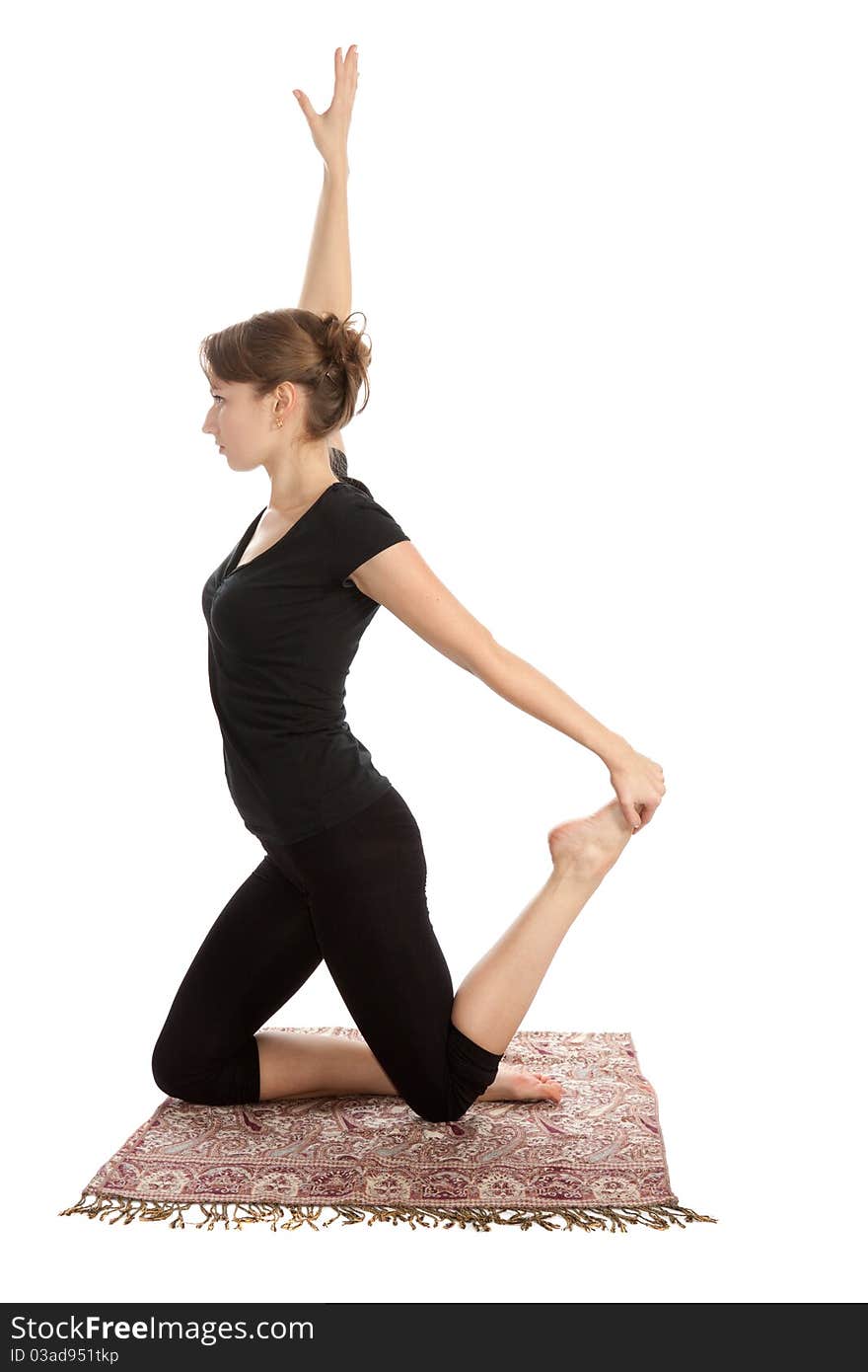 Young woman practicing Yoga exercises. Young woman practicing Yoga exercises.