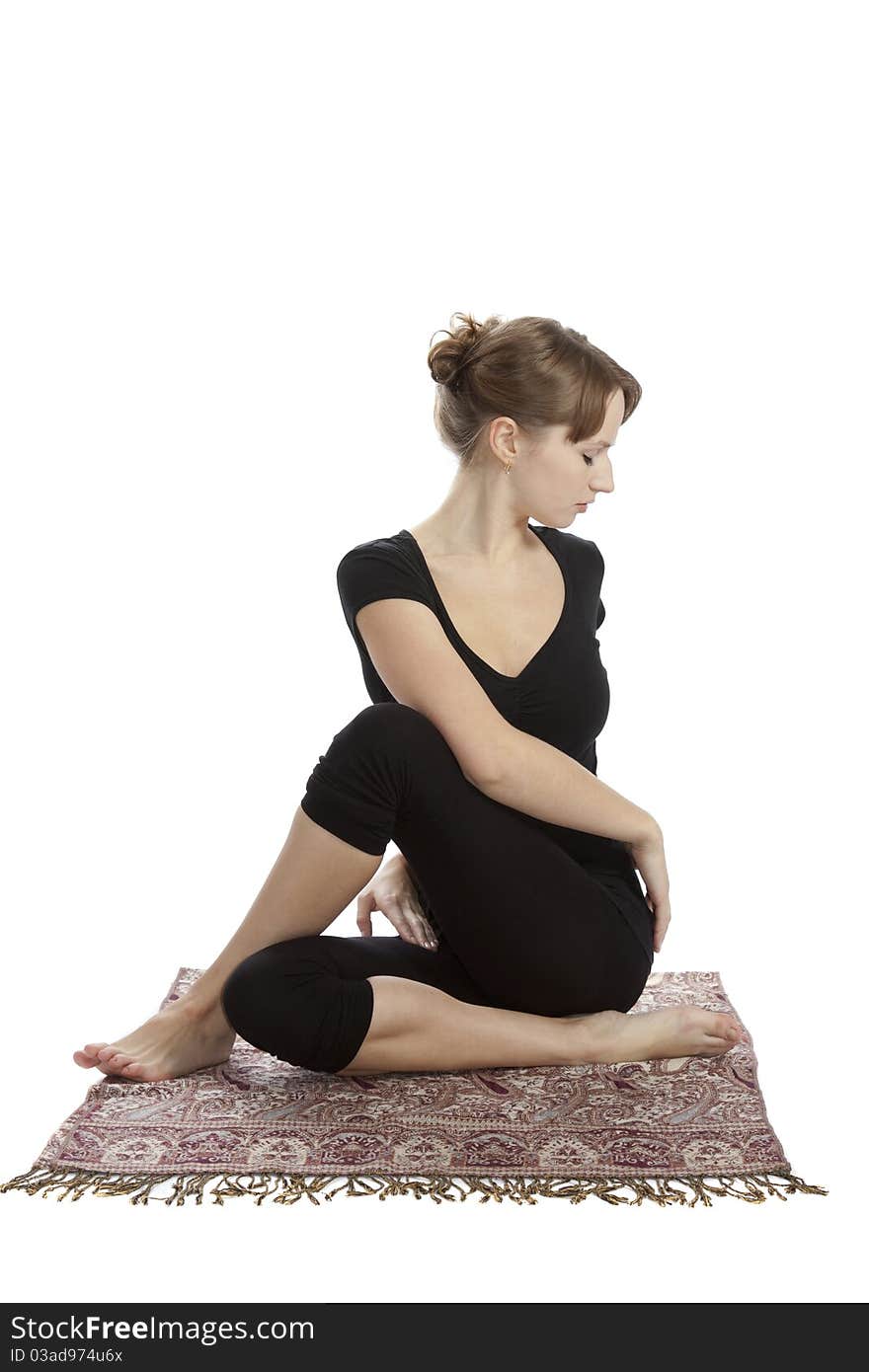 Young woman practicing Yoga exercises. Young woman practicing Yoga exercises.