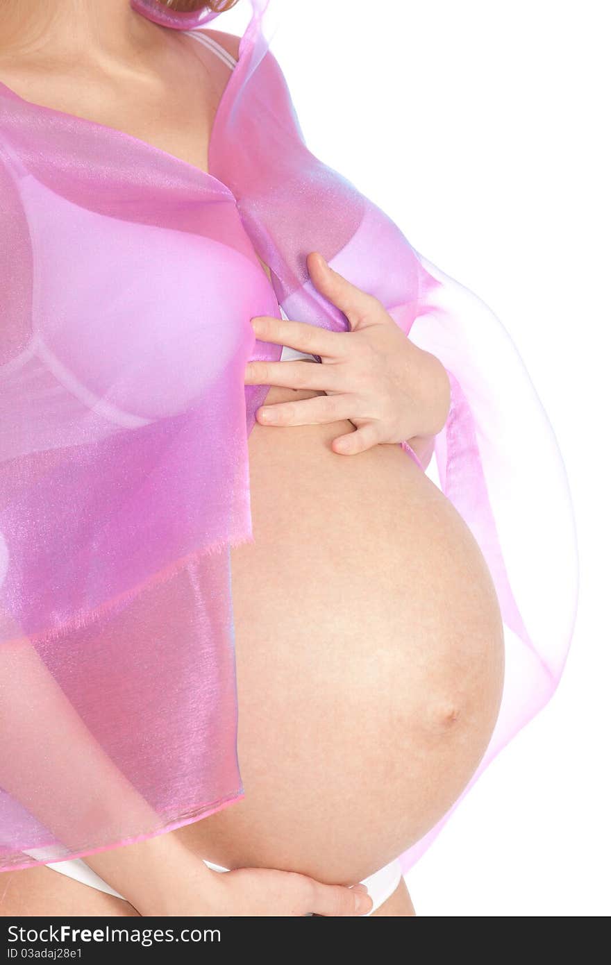 Pregnant tummy on an isolated white background. Pregnant tummy on an isolated white background