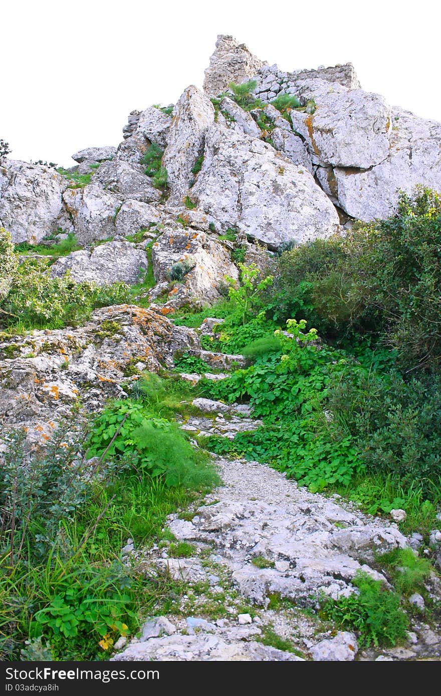 Path to the top of mountain from Kantara castle in Northern Cyprus.The origins of the castle go back to the 10th century. Path to the top of mountain from Kantara castle in Northern Cyprus.The origins of the castle go back to the 10th century.