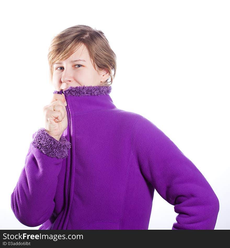 Young woman in a warm violet sweater