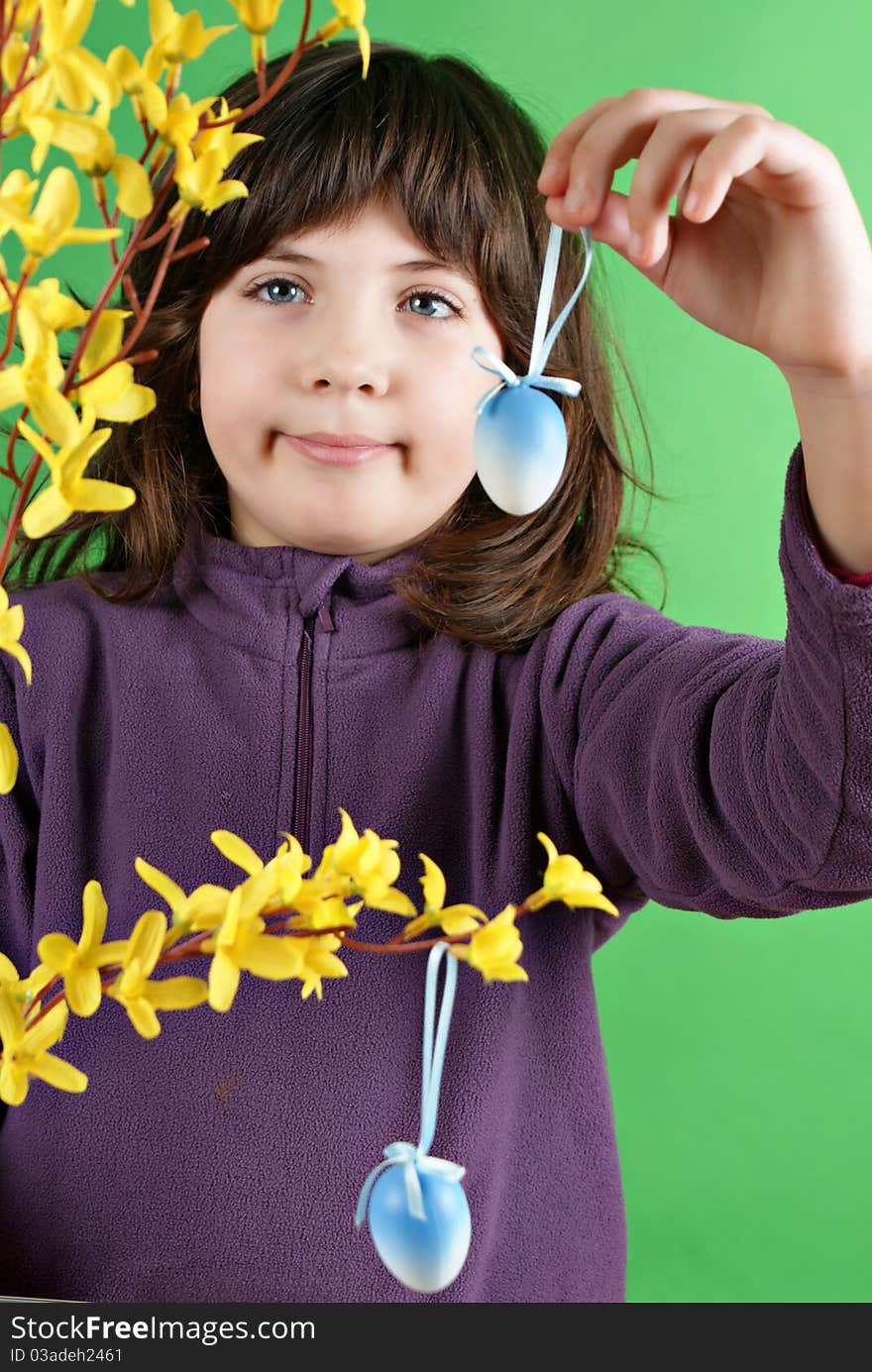 Little girl with easter eggs