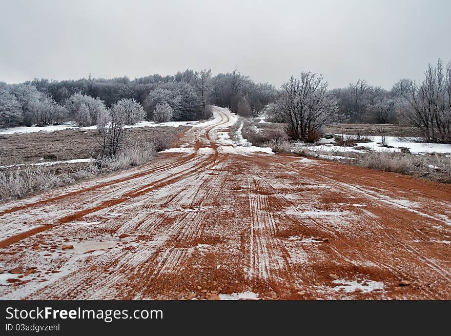 A dirt road in February