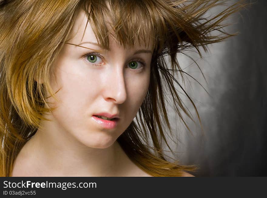 The potrait of a women with flying hair