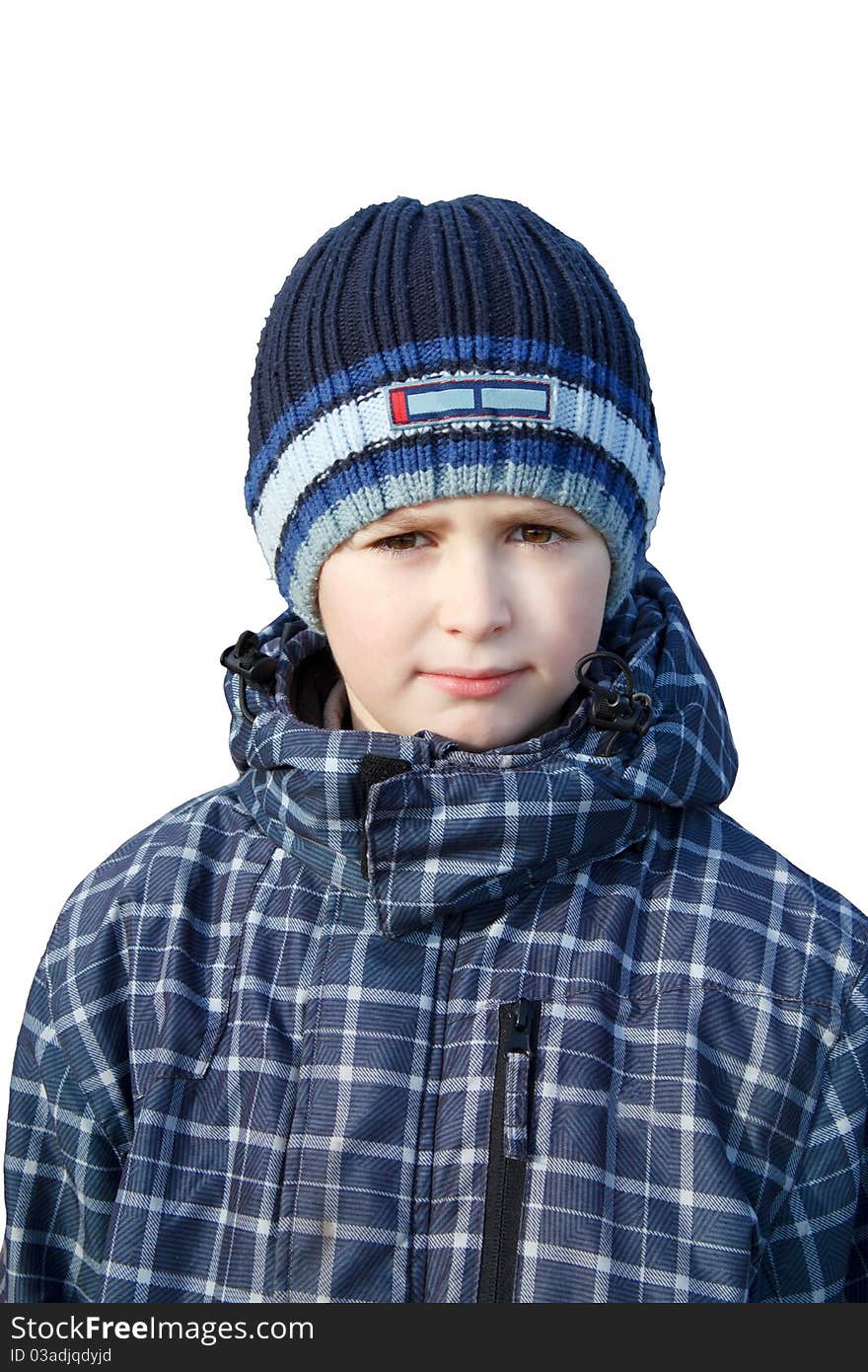 Small boy dressed to winter cloth isolated on white