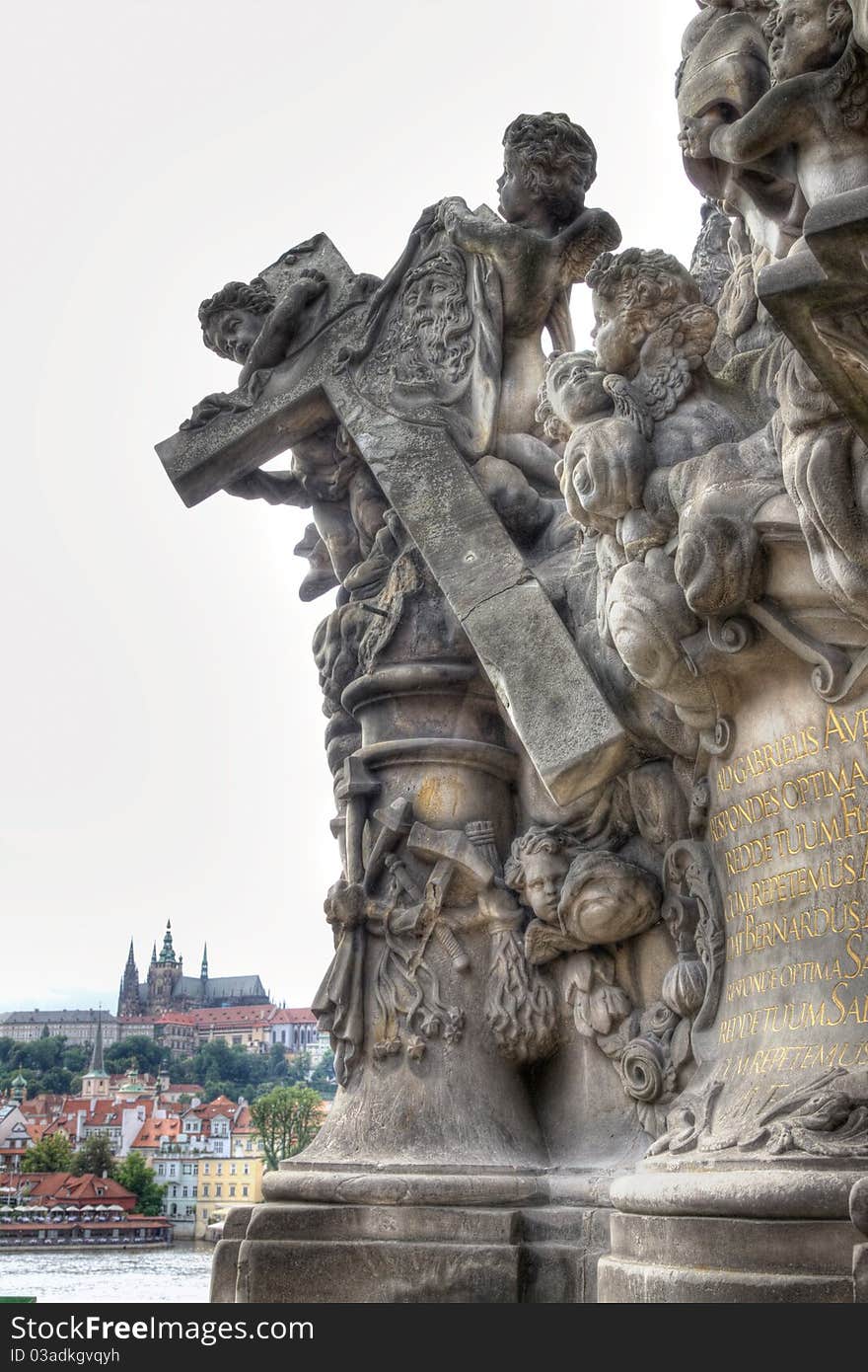 Baroque sculptural group and prague castle view