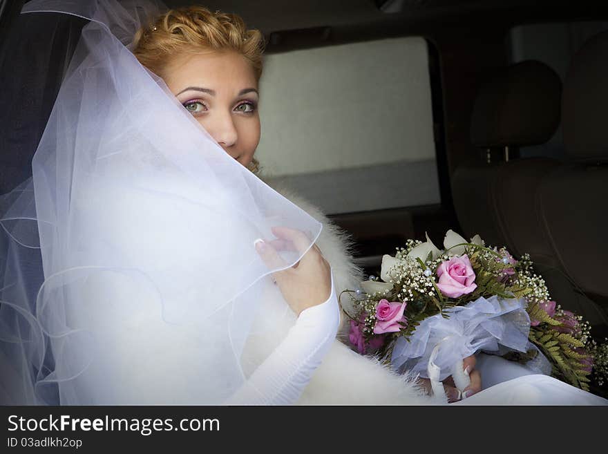 Pretty Bride In A Car Window