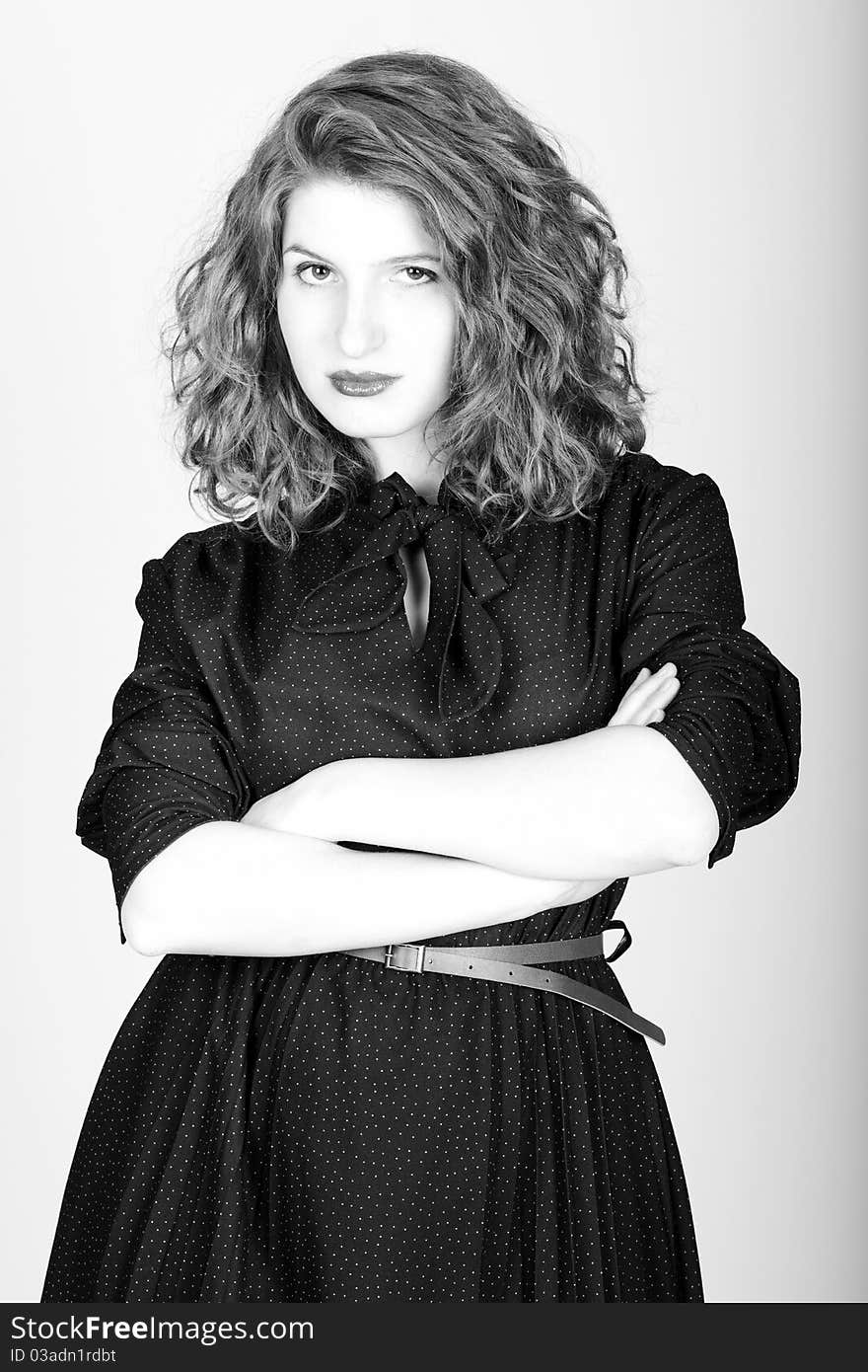 Desaturated portraite of beauty woman with curly hairs. Desaturated portraite of beauty woman with curly hairs