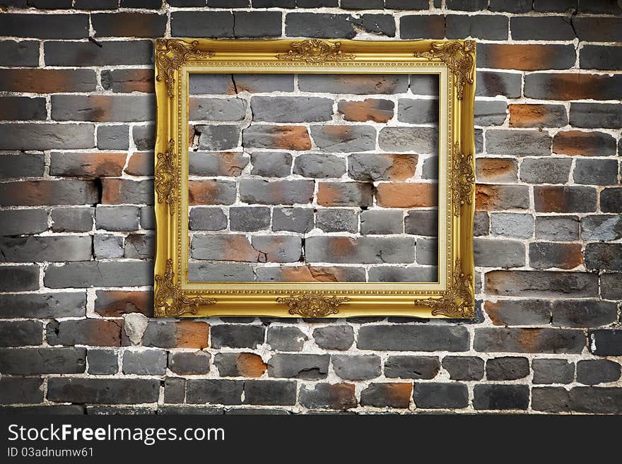 Golden Frame On Old Brick Wall