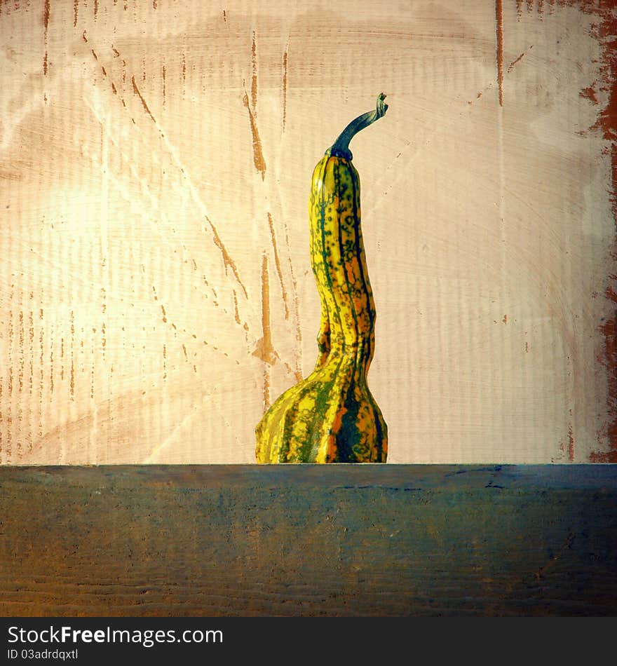 Decorative green and yellow pumpkin on almost white background. Decorative green and yellow pumpkin on almost white background