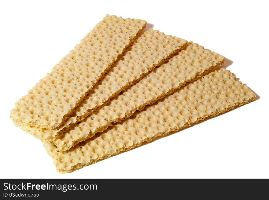 Nice isolated yellow crispbread on white background