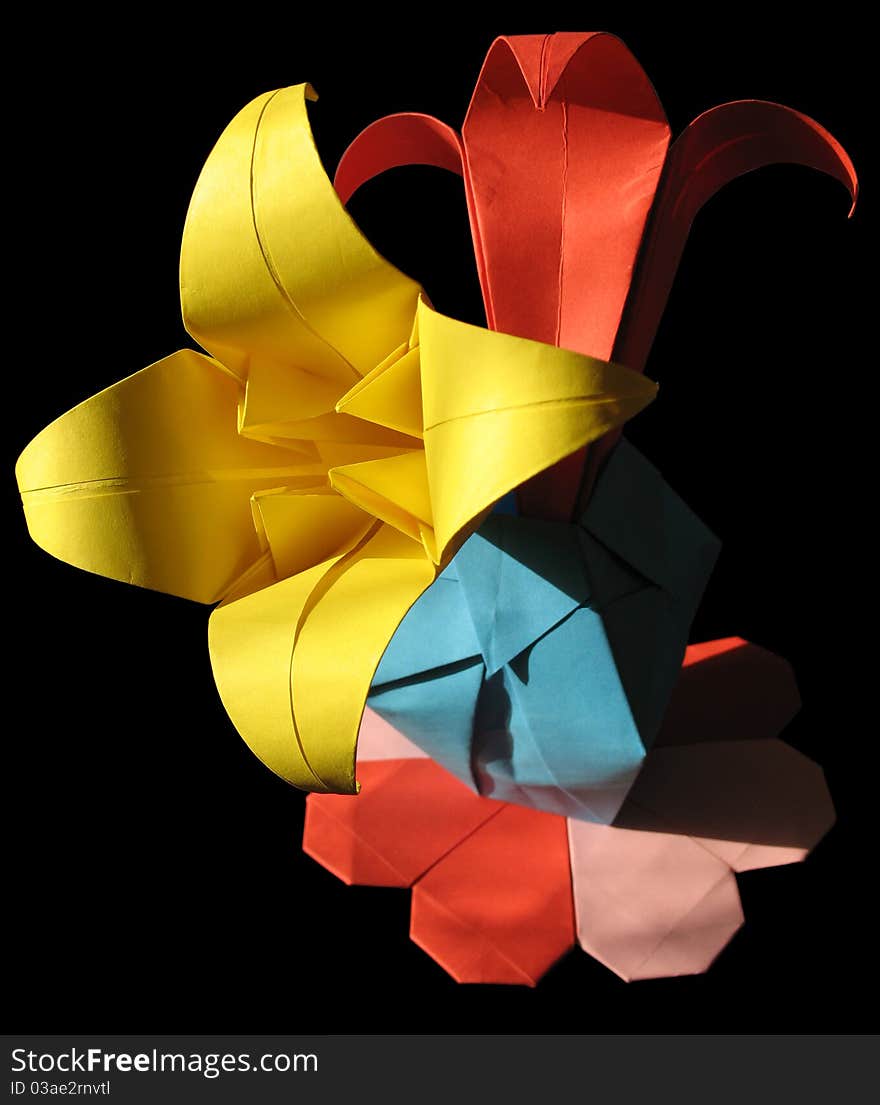 Origami bouquet isolated on black