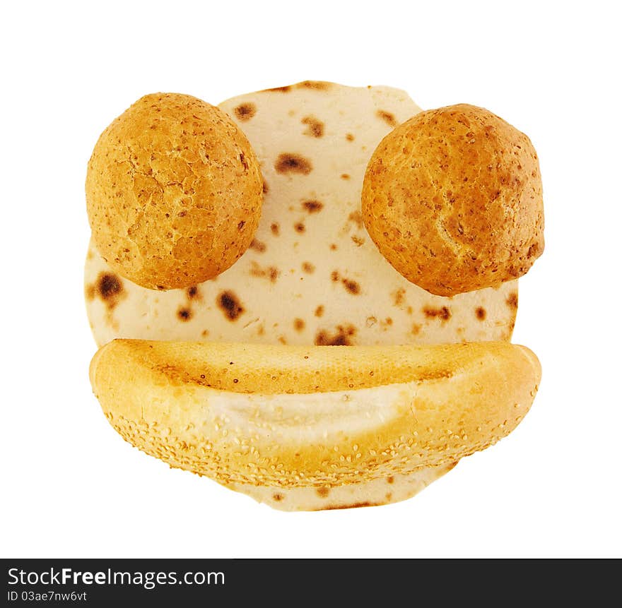 Cute smiling face made of pita and buns isolated on white with clipping path. Cute smiling face made of pita and buns isolated on white with clipping path