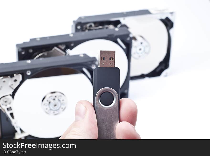 Pendrive in man hand on white background. Pendrive in man hand on white background