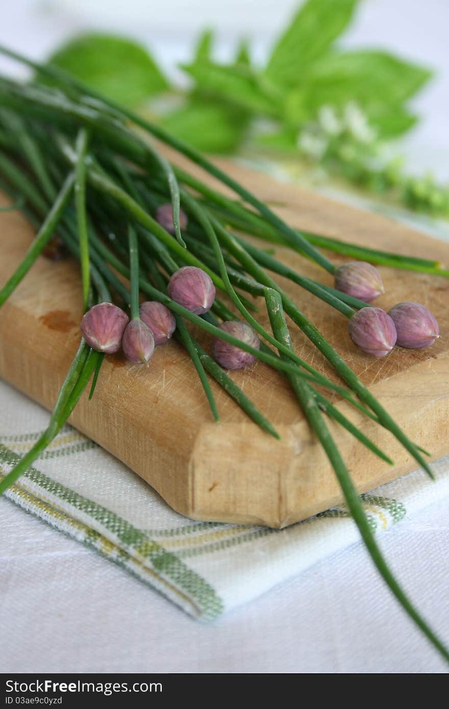 Chivel on a wooden cutting board