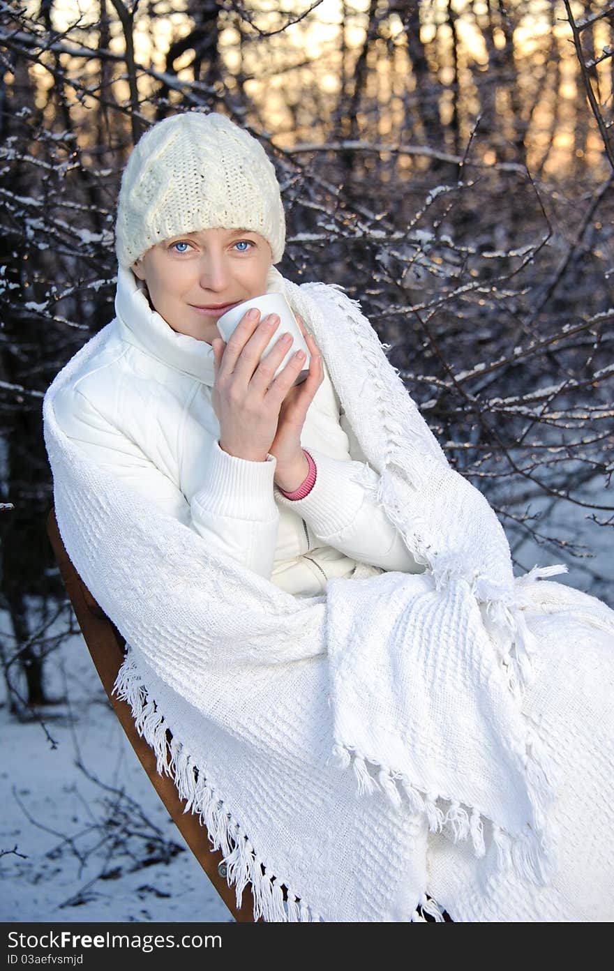 Woman in the winter forest