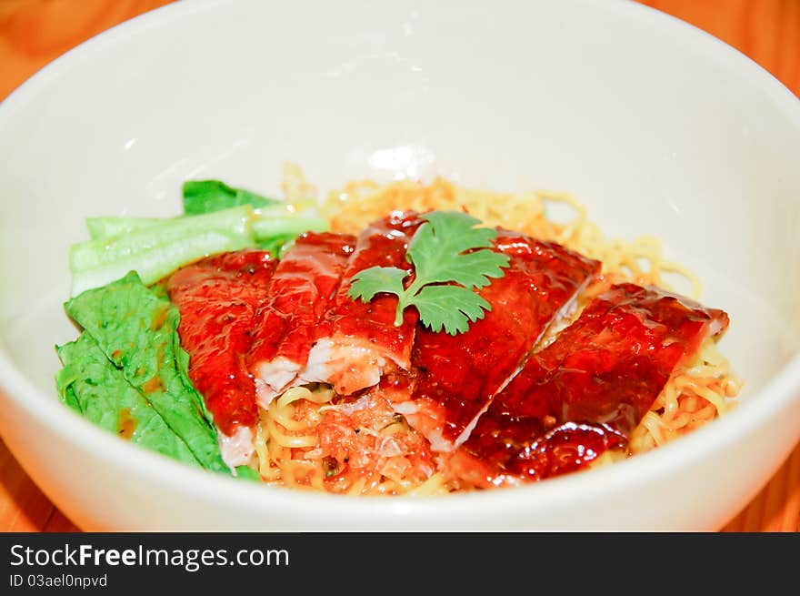 Duck noodle in white dish