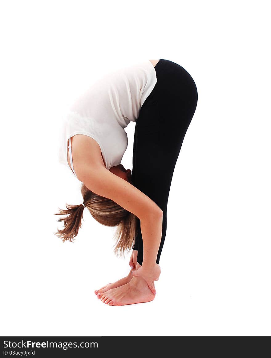 Beautiful girl practicing yoga on white background