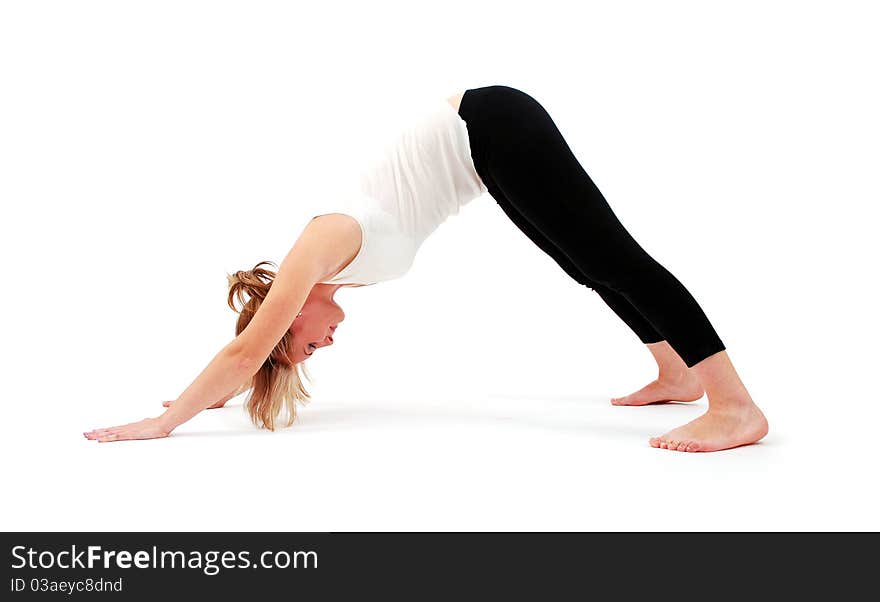 Beautiful girl practicing yoga on white background