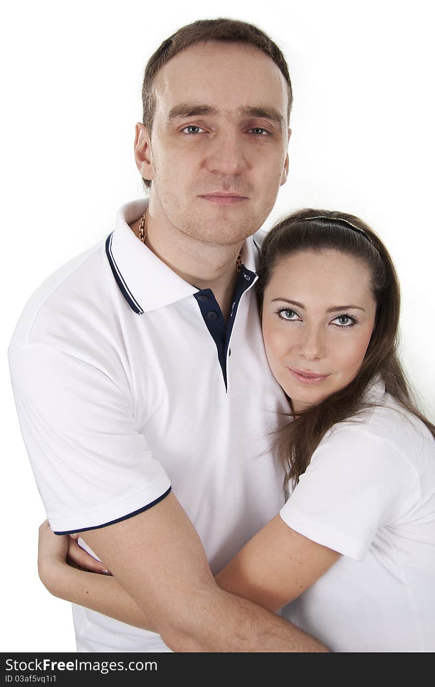 Young adults  man and woman in casual style stand on white isolation. Young adults  man and woman in casual style stand on white isolation